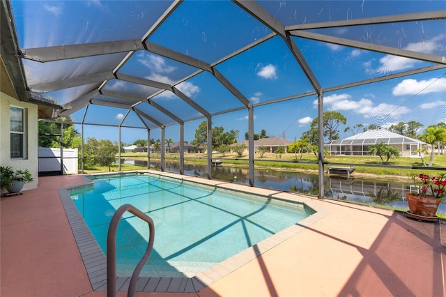 view of swimming pool with a patio area, a lanai, and a water view