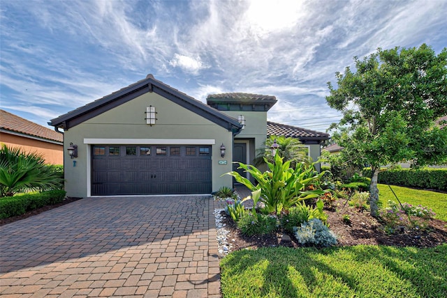 view of front of home with a garage