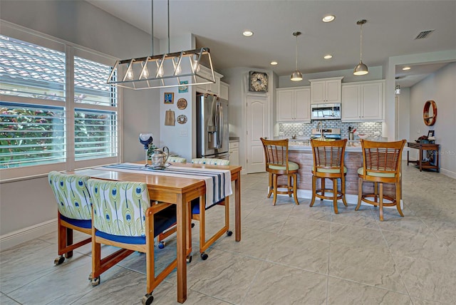 view of tiled dining room