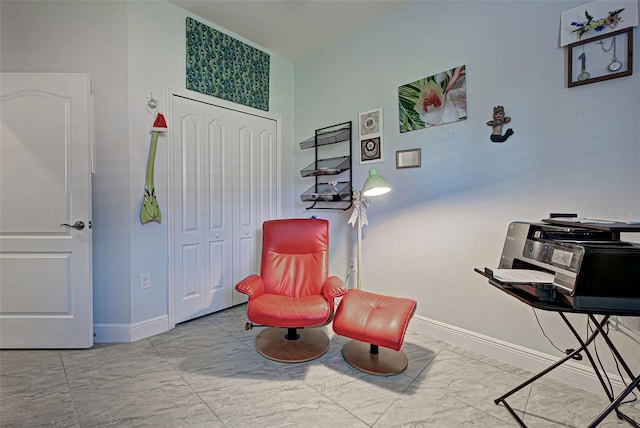 sitting room with light tile floors