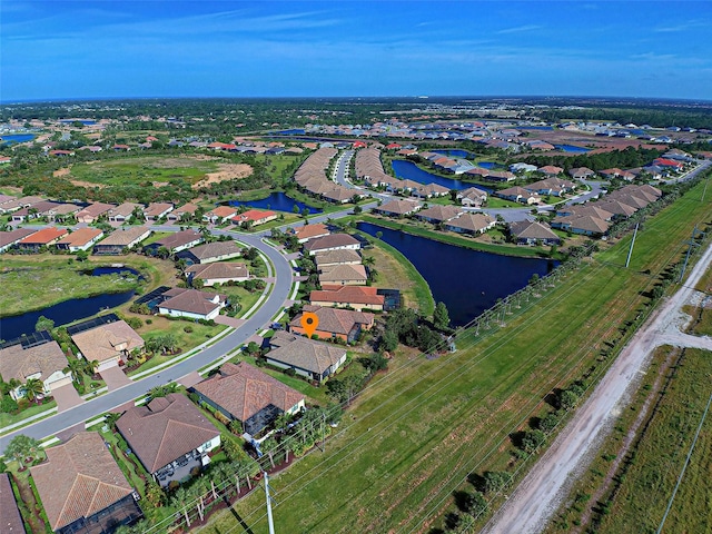 drone / aerial view featuring a water view