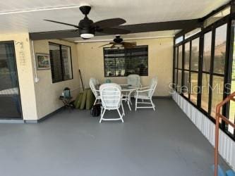 view of patio / terrace featuring ceiling fan