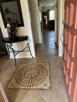 hallway featuring tile patterned floors