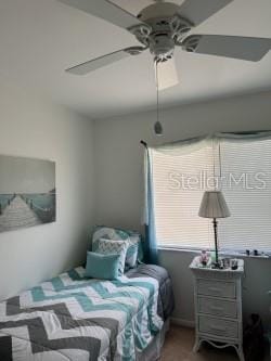 bedroom featuring ceiling fan