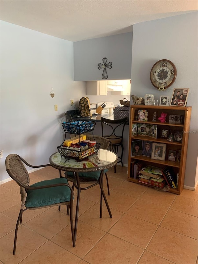 dining room with light tile patterned floors