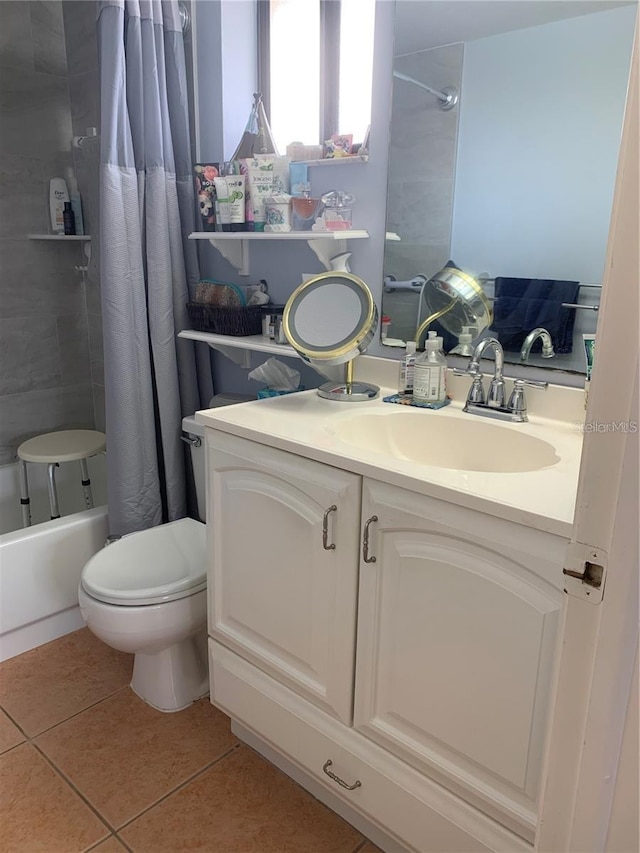 full bathroom with toilet, shower / tub combo, vanity, and tile patterned floors