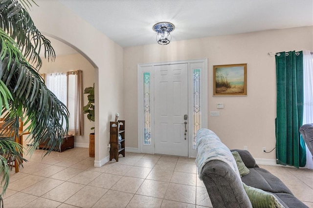 entrance foyer with light tile flooring