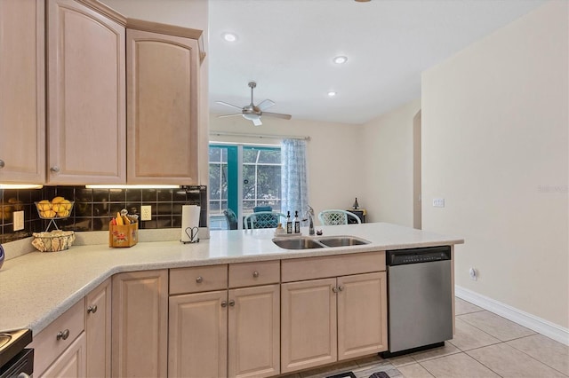 kitchen featuring ceiling fan, tasteful backsplash, light brown cabinetry, sink, and stainless steel dishwasher