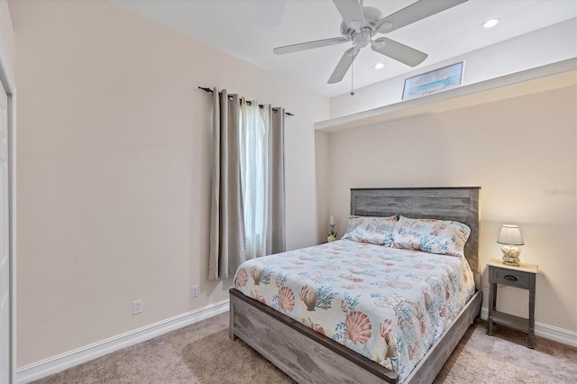 carpeted bedroom with ceiling fan