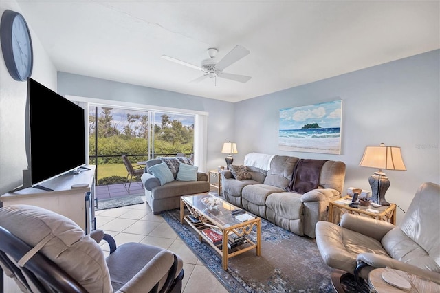 living room featuring ceiling fan and light tile floors