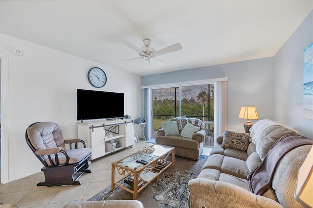 living room featuring ceiling fan and light tile floors