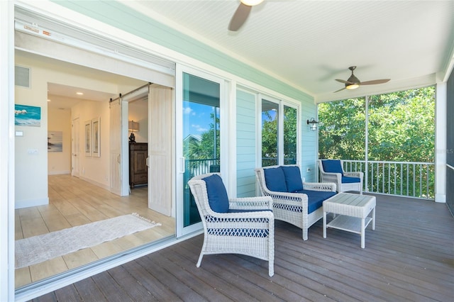 wooden terrace with ceiling fan