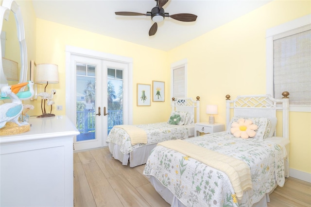 bedroom featuring french doors, ceiling fan, and light hardwood / wood-style floors