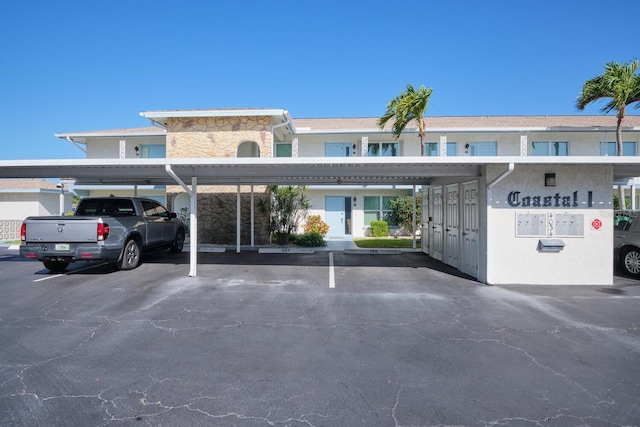 view of front facade featuring a carport