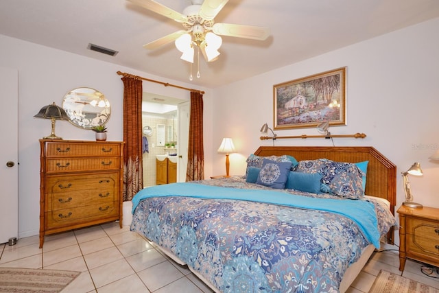 bedroom featuring ceiling fan and light tile floors