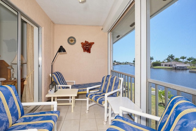 sunroom with a water view