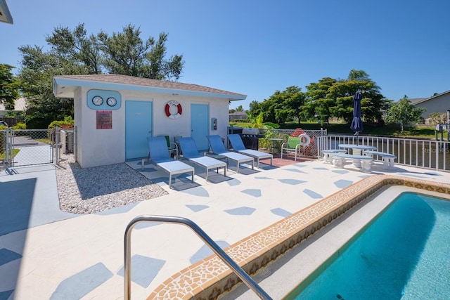 view of pool featuring a patio