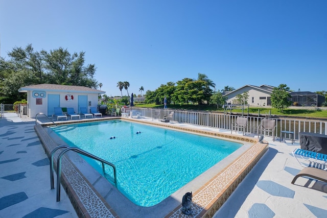 view of pool featuring a patio