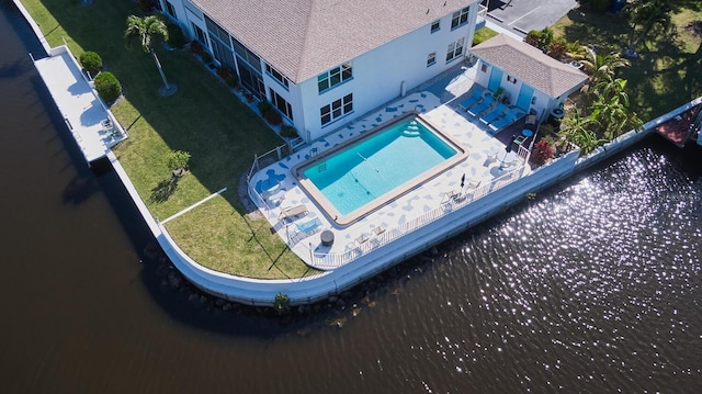 bird's eye view with a water view