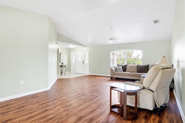 living room with ceiling fan, wood-type flooring, and high vaulted ceiling