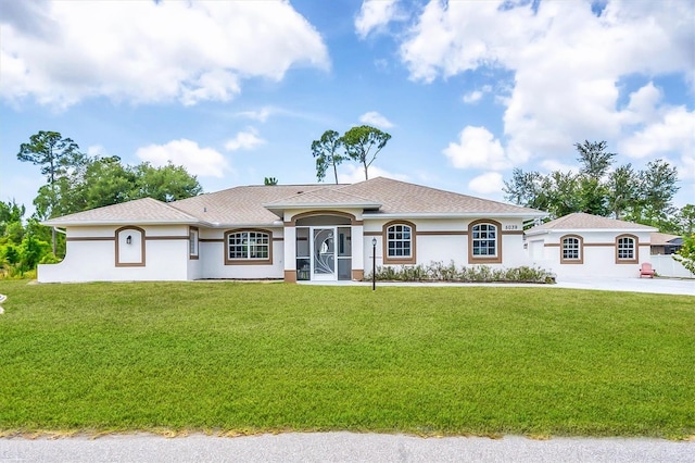 single story home with a front yard