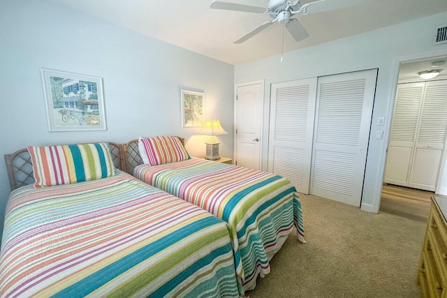 carpeted bedroom featuring ceiling fan