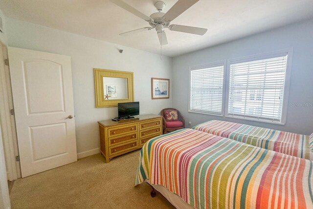 bedroom with carpet floors and ceiling fan