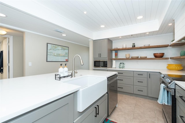 kitchen with gray cabinets, stainless steel appliances, light tile flooring, wood ceiling, and sink