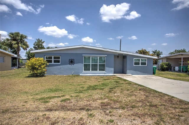 ranch-style home with a front yard