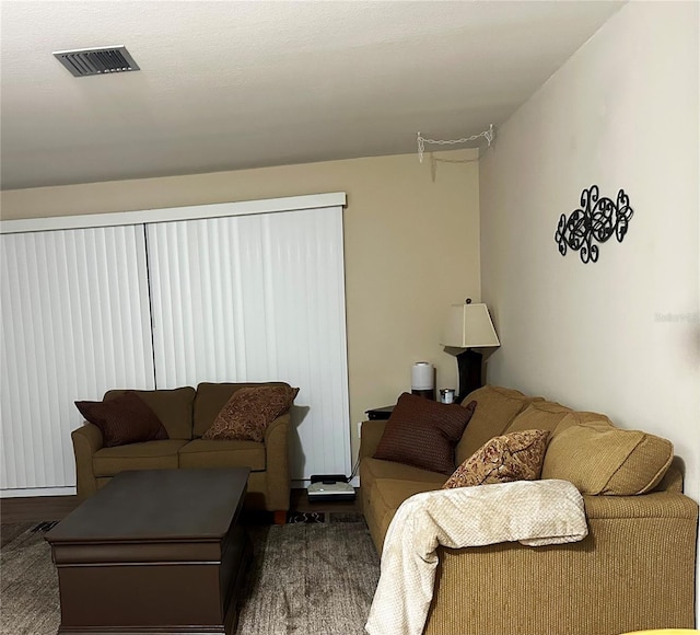 living room with dark wood-type flooring