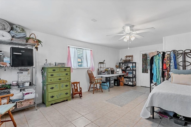 bedroom featuring ceiling fan and light tile flooring