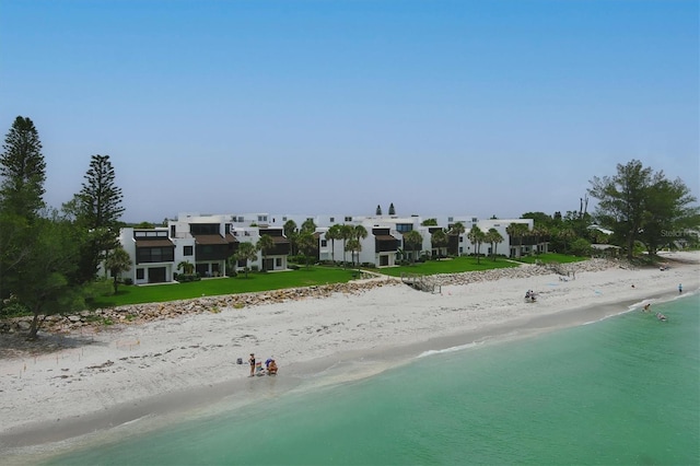 bird's eye view with a beach view and a water view