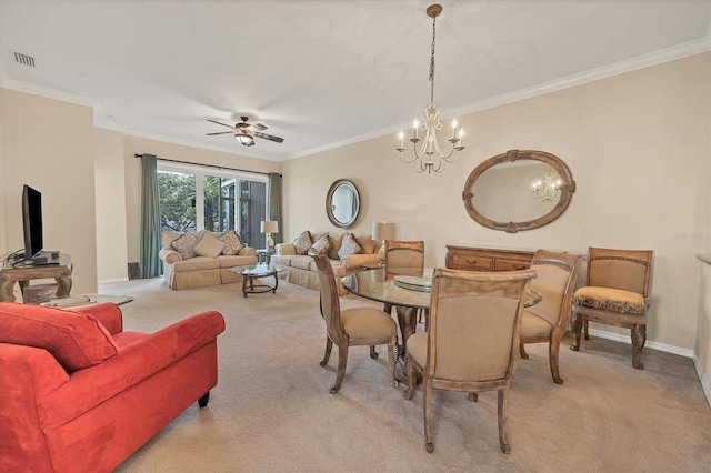 dining room featuring crown molding and light colored carpet