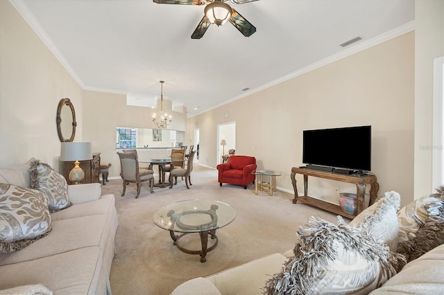 carpeted living room with ceiling fan with notable chandelier and ornamental molding