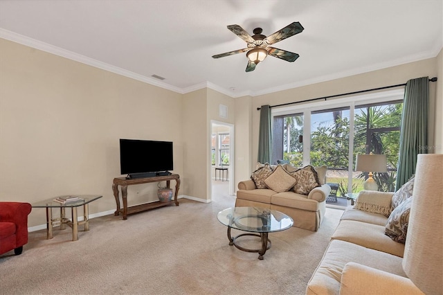 carpeted living room featuring ceiling fan and ornamental molding