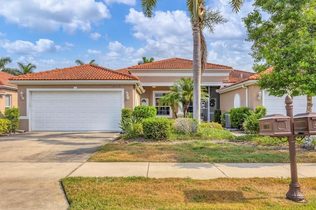 mediterranean / spanish-style home featuring a garage