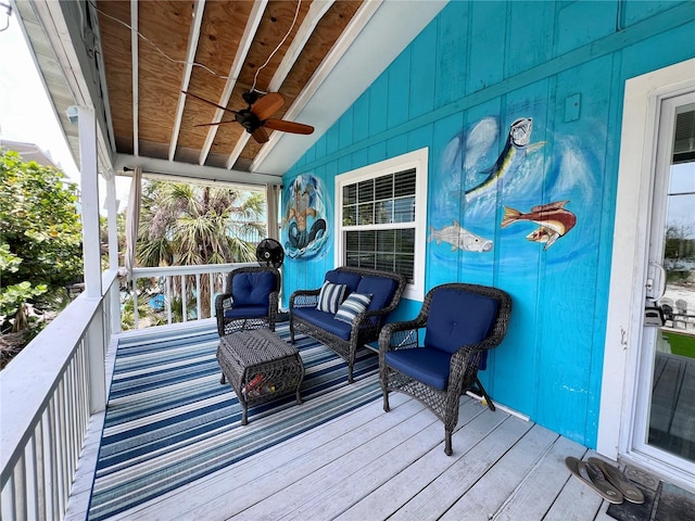 wooden deck with ceiling fan