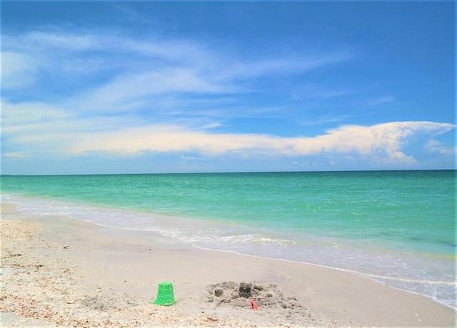 property view of water featuring a view of the beach