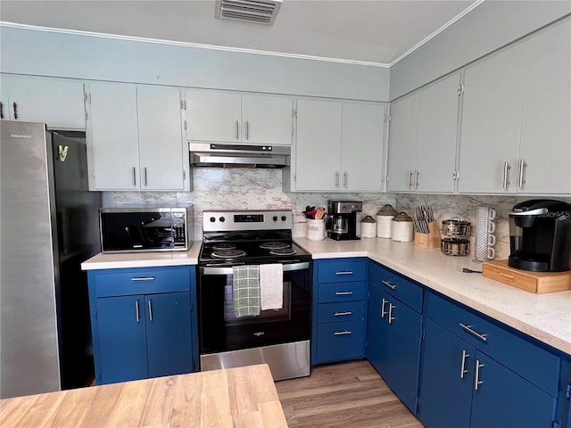 kitchen featuring blue cabinetry, appliances with stainless steel finishes, light wood-type flooring, and white cabinets