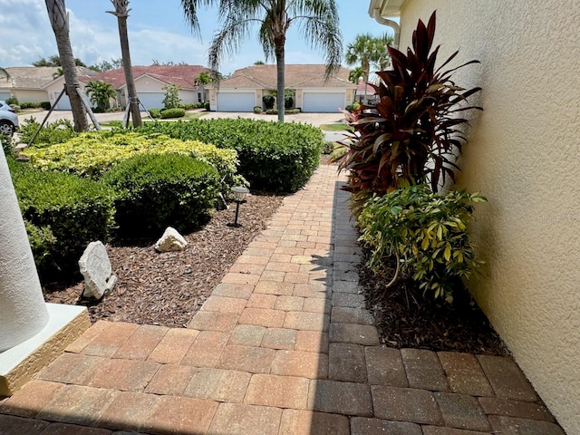 view of yard featuring a garage