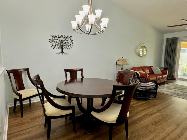 dining room with a notable chandelier and hardwood / wood-style flooring