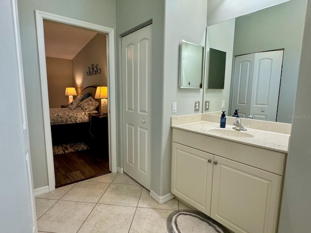 bathroom featuring hardwood / wood-style flooring and vanity