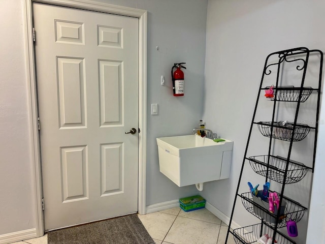 bathroom featuring tile flooring