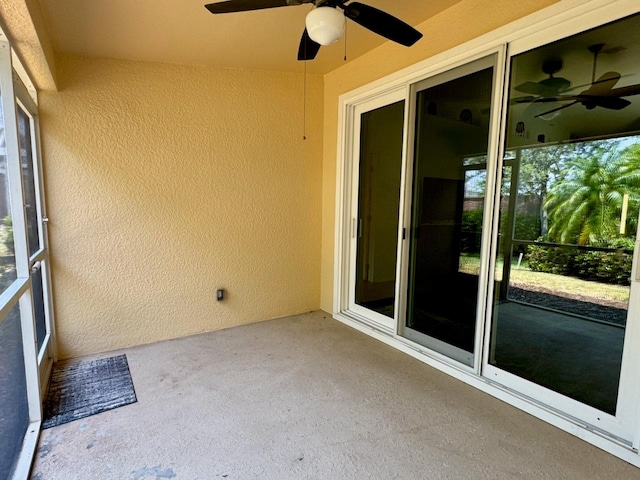 exterior space featuring ceiling fan