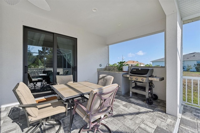 view of patio featuring a grill