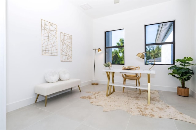 tiled office featuring baseboards