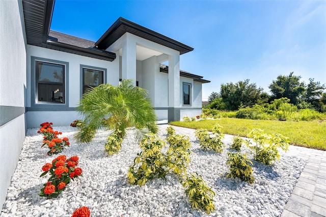 exterior space featuring stucco siding