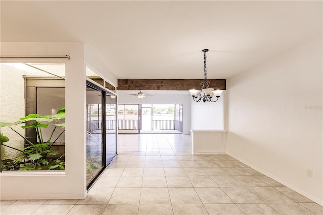 interior space with beamed ceiling and ceiling fan with notable chandelier