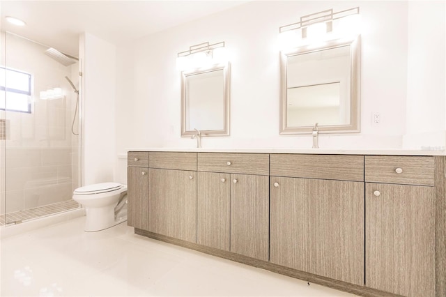 bathroom with tile patterned flooring, toilet, vanity, and walk in shower