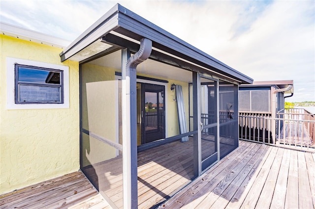 deck featuring a sunroom